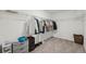 Spacious walk-in closet with ample storage and shelving at 34797 Rainville Loop, Zephyrhills, FL 33541