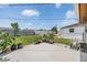 A private backyard with a patio, grass, and a fence, perfect for entertaining or relaxing at 3818 Beechwood Dr, Holiday, FL 34691