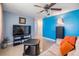 Bright living room with a large television and comfortable seating at 3818 Beechwood Dr, Holiday, FL 34691