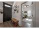 Entryway featuring a decorative front door and a view into a bright home office at 409 E Frances Ave, Tampa, FL 33602