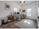 Bright home office featuring hardwood floors, natural light, and modern decor at 409 E Frances Ave, Tampa, FL 33602