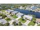 Beautiful aerial view of a waterfront property, nestled in a tranquil coastal community with lush greenery at 4123 Daisy Dr, Hernando Beach, FL 34607