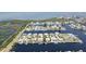 Picture of a waterfront neighborhood highlighting its stunning houses and water access, with surrounding greenery at 4123 Daisy Dr, Hernando Beach, FL 34607