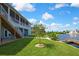 Enjoy waterfront views from this home's backyard, featuring a well-maintained lawn and private dock at 4123 Daisy Dr, Hernando Beach, FL 34607