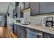 A kitchen features white subway tile, stainless steel appliances, and quartz countertops at 4123 Daisy Dr, Hernando Beach, FL 34607