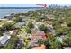 Stunning aerial view of the property's location, highlighting its proximity to the water and downtown Tampa skyline at 443 Lucerne Ave, Tampa, FL 33606