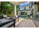Outdoor space featuring a backyard, lounge seating, and modern pool at 443 Lucerne Ave, Tampa, FL 33606