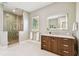Contemporary bathroom featuring a frameless glass shower, modern vanity, and neutral color palette at 443 Lucerne Ave, Tampa, FL 33606