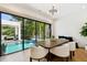Dining room area with view of pool and patio at 443 Lucerne Ave, Tampa, FL 33606