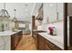 Beautiful kitchen with stone countertops, stainless appliances, and open layout at 443 Lucerne Ave, Tampa, FL 33606