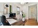 Modern office with a large desk, stylish decor, and ample natural light at 443 Lucerne Ave, Tampa, FL 33606