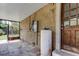 Covered patio with water heater, and access to backyard at 4479 Newark N St, St Petersburg, FL 33714