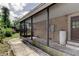 Enclosed patio with access to yard at 4479 Newark N St, St Petersburg, FL 33714