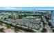 Scenic aerial view of a community near the water, tennis courts, and downtown at 501 Knights Run Ave # 1209, Tampa, FL 33602