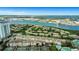 Coastal community aerial shot showcasing its building layout, nearby waterways, and recreational facilities at 501 Knights Run Ave # 1209, Tampa, FL 33602