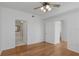 Bedroom with hardwood floors and access to other rooms at 501 Knights Run Ave # 1209, Tampa, FL 33602