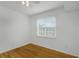 Inviting bedroom with hardwood floors and natural light at 501 Knights Run Ave # 1209, Tampa, FL 33602
