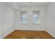 Bright bedroom with hardwood floors and natural light at 501 Knights Run Ave # 1209, Tampa, FL 33602