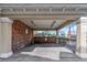 Community car wash area with brick siding and an iron rail overlooking the community with plenty of shade at 501 Knights Run Ave # 1209, Tampa, FL 33602