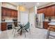 Spacious kitchen featuring stainless steel appliances and adjacent dining area at 5141 Riva Ridge Dr, Wesley Chapel, FL 33544