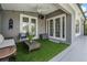 Cozy screened patio featuring comfortable seating and views of the outdoor space at 5141 Riva Ridge Dr, Wesley Chapel, FL 33544