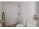 Bathroom with shower, sink, and toilet featuring white subway tile at 5832 Portal Rd, New Port Richey, FL 34655