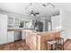 The charming kitchen features stainless steel appliances, a breakfast bar, and ample counter space at 593 Marmora Ave, Tampa, FL 33606