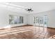 A neutral living room with tile flooring, a light color scheme, and plenty of natural light at 593 Marmora Ave, Tampa, FL 33606