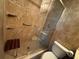 Neutral bathroom with a glass walk-in shower, and tile flooring, as well as a bench at 750 Island Way # 101, Clearwater Beach, FL 33767