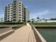 Community dock with beautiful waterfront views, perfect for a stroll or fishing at 750 Island Way # 101, Clearwater Beach, FL 33767