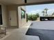 Building entrance with sidewalk and courtyard with assigned covered parking at 750 Island Way # 101, Clearwater Beach, FL 33767