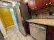 Functional kitchen space with stainless steel appliances and granite countertops for meal preparation and dining at 750 Island Way # 101, Clearwater Beach, FL 33767