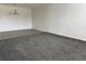 Spacious living room featuring tiled flooring and carpet in different sections with overhead lighting at 750 Island Way # 101, Clearwater Beach, FL 33767