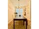 Well-lit dining area with a wooden table and hardwood floors at 7543 Red Mill Circle Cir, New Port Richey, FL 34653