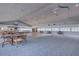 Large ballroom with dance floor, tables, chairs, and ample natural light at 7932 Sailboat Key S Blvd # 406, South Pasadena, FL 33707