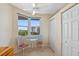 Cozy breakfast nook with a ceiling fan, exterior views, and adjacent pantry in a well-lit area at 7932 Sailboat Key S Blvd # 406, South Pasadena, FL 33707
