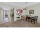 Dining area near the kitchen features a breakfast bar and views of the open-concept living space at 7932 Sailboat Key S Blvd # 406, South Pasadena, FL 33707