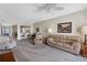 Warm and inviting living room featuring comfortable furnishings, neutral colors, and an open floor plan at 7932 Sailboat Key S Blvd # 406, South Pasadena, FL 33707