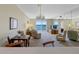 Comfortable living space with view, neutral decor, and an inviting open floor plan at 7932 Sailboat Key S Blvd # 406, South Pasadena, FL 33707