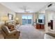 Bright living room offering waterfront views and neutral tones, and an open layout at 7932 Sailboat Key S Blvd # 406, South Pasadena, FL 33707