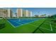 Beautiful tennis courts on lush green turf, perfect for an active lifestyle at 7932 Sailboat Key S Blvd # 406, South Pasadena, FL 33707