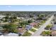 This aerial view shows the property in relation to the streets and surrounding homes in the neighborhood at 8030 Jasmine Blvd, Port Richey, FL 34668