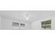 Bedroom with ample light through windows at 8030 Jasmine Blvd, Port Richey, FL 34668