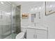 Modern bathroom featuring a glass-enclosed shower, sleek vanity, and contemporary fixtures at 9000 Bay Ne St, St Petersburg, FL 33702