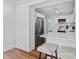 Bright, modern kitchen with stainless steel appliances, quartz countertops, and barstool seating at 9000 Bay Ne St, St Petersburg, FL 33702