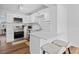Kitchen featuring stainless steel appliances, white cabinets, and a breakfast bar with stools at 9000 Bay Ne St, St Petersburg, FL 33702