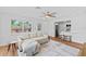Inviting living room showcasing a comfortable sectional sofa and an open view to the kitchen at 9000 Bay Ne St, St Petersburg, FL 33702
