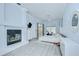 Bright bedroom with fireplace and sliding door access to pool area and dedicated exercise equipment at 9813 Woodbay Dr, Tampa, FL 33626