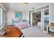 View of sitting area with daybed and table next to the Primary bedroom at 100 Bluff View Dr # 511C, Belleair Bluffs, FL 33770