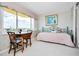 Cozy sitting area with a table, chairs, and daybed provides a great view of the city at 100 Bluff View Dr # 511C, Belleair Bluffs, FL 33770